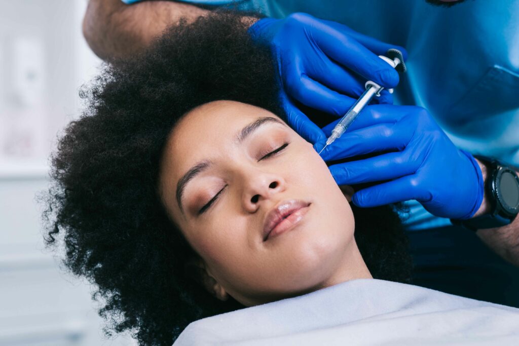 African Woman Getting Botox Injection on her Cheeks | InVein Aesthetics in Baltimore, MD